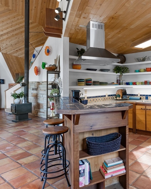 kitchen and bar area inside a short term vacation rental